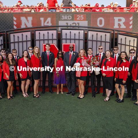 UNL Chancellor Rodney D. Bennett and his wife, Temple, pose with the 2024 Homecoming Court. Nebraska vs Rutgers football game. Homecoming game. October 5, 2024. Photo by Craig Chandler / University Communication and Marketing.