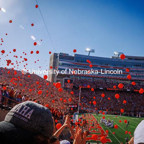 Red balloons are released at the Nebraska vs Rutgers football game. Homecoming game. October 5, 2024. Photo by Kristen Labadie / University Communication.