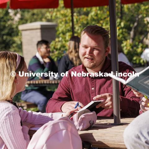 Law students studying outside. College of Law photoshoot. October 10, 2024. Photo by Craig Chandler / University Communication and Marketing.