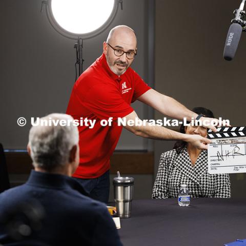 Aaron Nix of University Communication and Marketing claps the start of the video session. NHRI Leadership Mentoring round table during the group’s 75th anniversary meetings. November 8, 2024. Photo by Craig Chandler / University Communication.