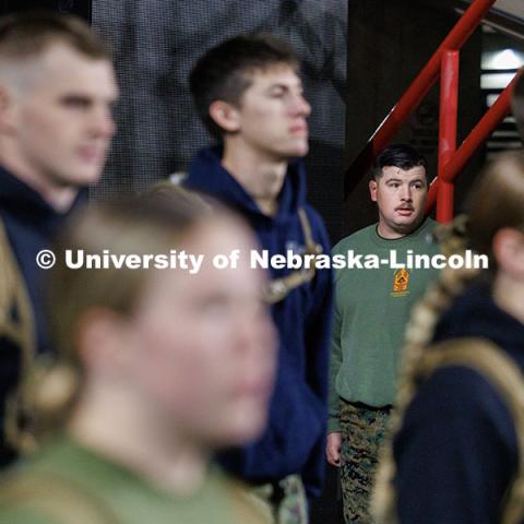 NROTC Staff Sergeant Dylon Taylor directs midshipmen into Memorial Stadium. Navy and Marine Corps 249th birthday celebration physical training in Memorial Stadium. November 8, 2024. Photo by Jordan Opp / University Communication and Marketing.