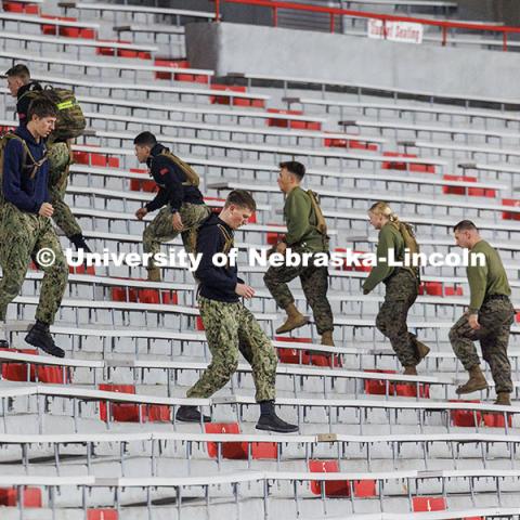 NROTC midshipmen climb flights of east stadium stairs. Navy and Marine Corps 249th birthday celebration physical training in Memorial Stadium. November 8, 2024. Photo by Jordan Opp / University Communication and Marketing.