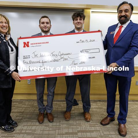 Trey Johnson and Joey Idstein stand with their second-place check. Fall 2024 Center for Sales Role-Play Competition. November 15, 2024. Photo by Jordan Opp / University Communication and Marketing.