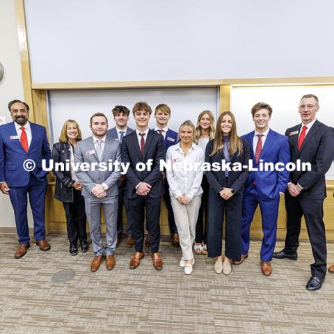 Professors and event organizers pose for a photo with the final four teams. Fall 2024 Center for Sales Role-Play Competition. November 15, 2024. Photo by Jordan Opp / University Communication and Marketing.