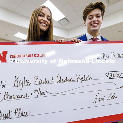 Kylie Eads and Aidan Kelch stand with their first-place check. Fall 2024 Center for Sales Role-Play Competition. November 15, 2024. Photo by Jordan Opp / University Communication and Marketing.