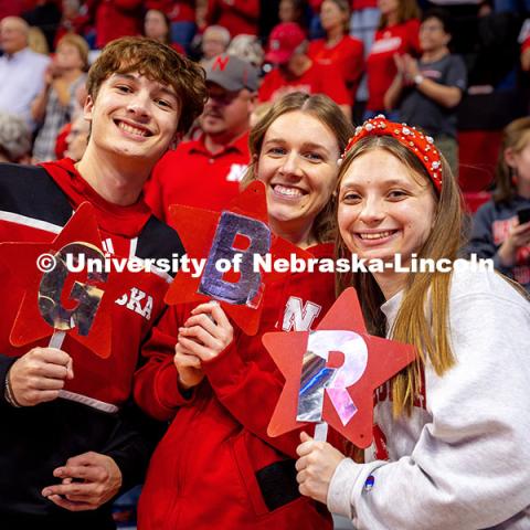 Fans hold “GBR” stars at the Nebraska vs. Minnesota volleyball game. November 14, 2024. Photo by Kristen Labadie / University Communication.