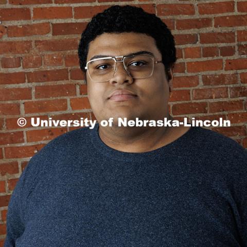 Studio portrait of Tavion Davis, Digital Content Sepcialist, University Communication and Marketing. November 18, 2024. Photo by Craig Chandler / University Communication.