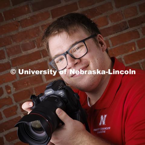 Studio portrait of Jordan Opp, Communications and Marketing Photographer, University Communication and Marketing. November 18, 2024. Photo by Craig Chandler / University Communication.