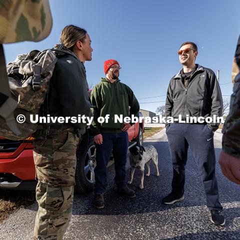 UNL Student Veterans of America treasurer Brett Klein (right) thanks the four volunteers after arriving in Alvo. Ruck March. November 21, 2024. Photo by Jordan Opp / University Communication and Marketing.