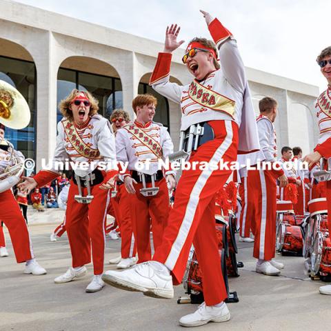 Members of the Cornhusker Marching Band bring the energy during their concert outside the Sheldon Museum of Art. Nebraska vs. Wisconsin football game. November 23, 2024. Photo by Jordan Opp / University Communication and Marketing.