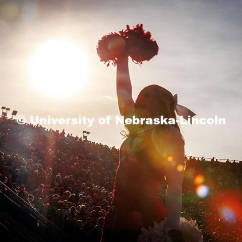 Silhouette of Husker cheerleader cheering at the Huskers vs. Wisconsin football game. November 23, 2024. Photo by Kristen Labadie / University Communication.