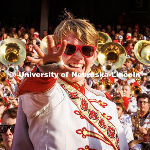 A band member celebrates a touchdown at the Huskers vs. Wisconsin football game. November 23, 2024. Photo by Kristen Labadie / University Communication.