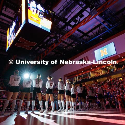 Light shines on the Husker volleyball team as they are being introduced during round one of the NCAA Volleyball Tournament at the Bob Devaney Sports Center. Nebraska vs. Florida A&M Volleyball game. Photo by Jordan Opp / University Communication and Marketing.